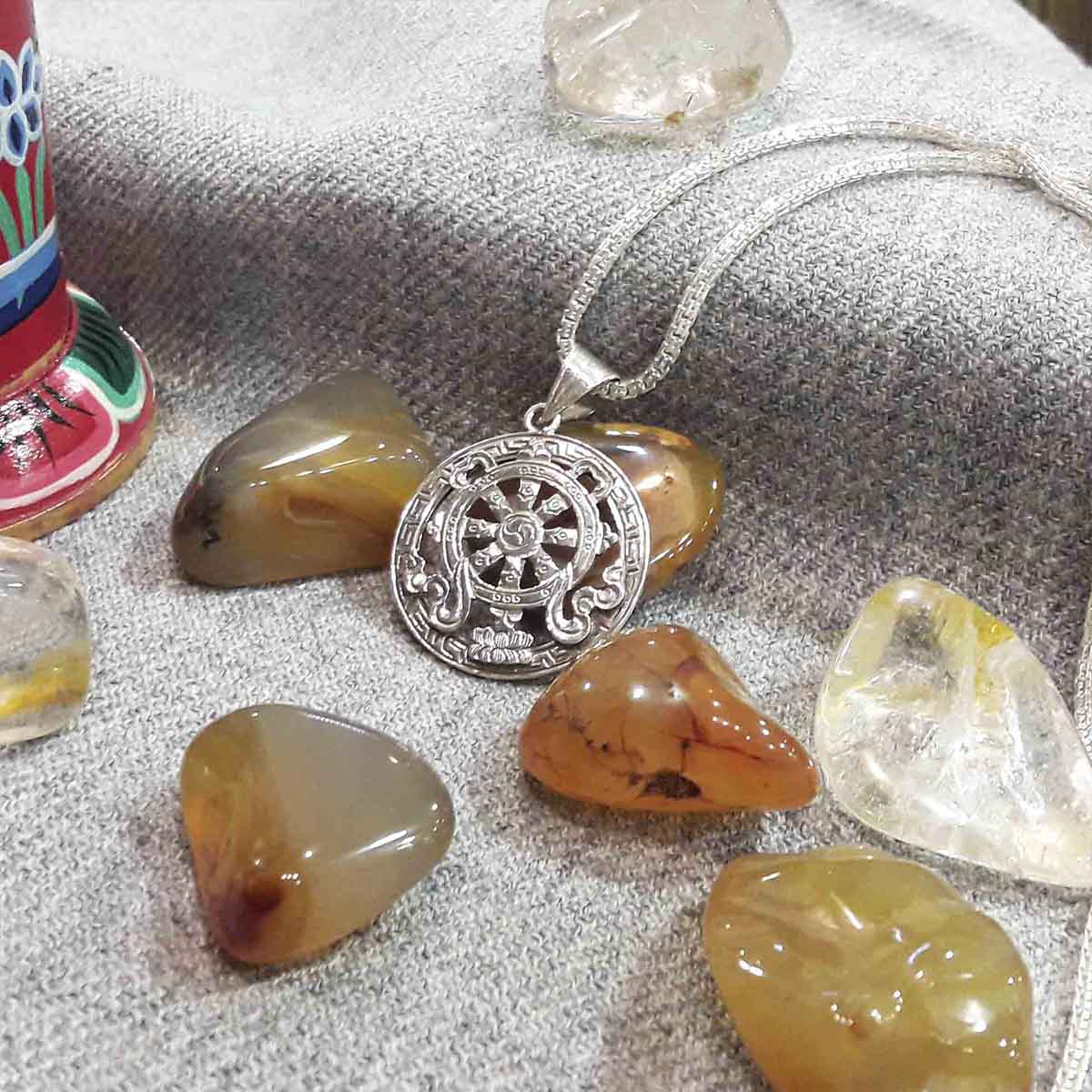 Colgante Rueda del Dharma - Tienda Budista